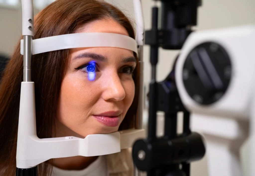 Side view woman getting her eyes checked