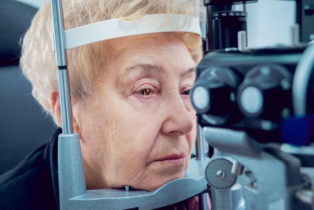 an older woman is conducting an eye test