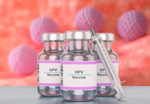 Bottle of human papilloma virus HPV vaccine with syringe